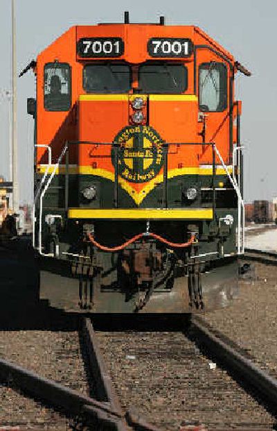 
A Burlington Northern Santa Fe trains waits to leave the railyard near Fort Worth, Texas. 
 (Associated Press / The Spokesman-Review)