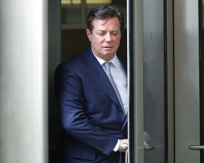 Paul Manafort, President Donald Trump's former campaign chairman, leaves the federal courthouse in Washington, Wednesday, Feb. 14, 2018. (Pablo Martinez Monsivais / Associated Press)