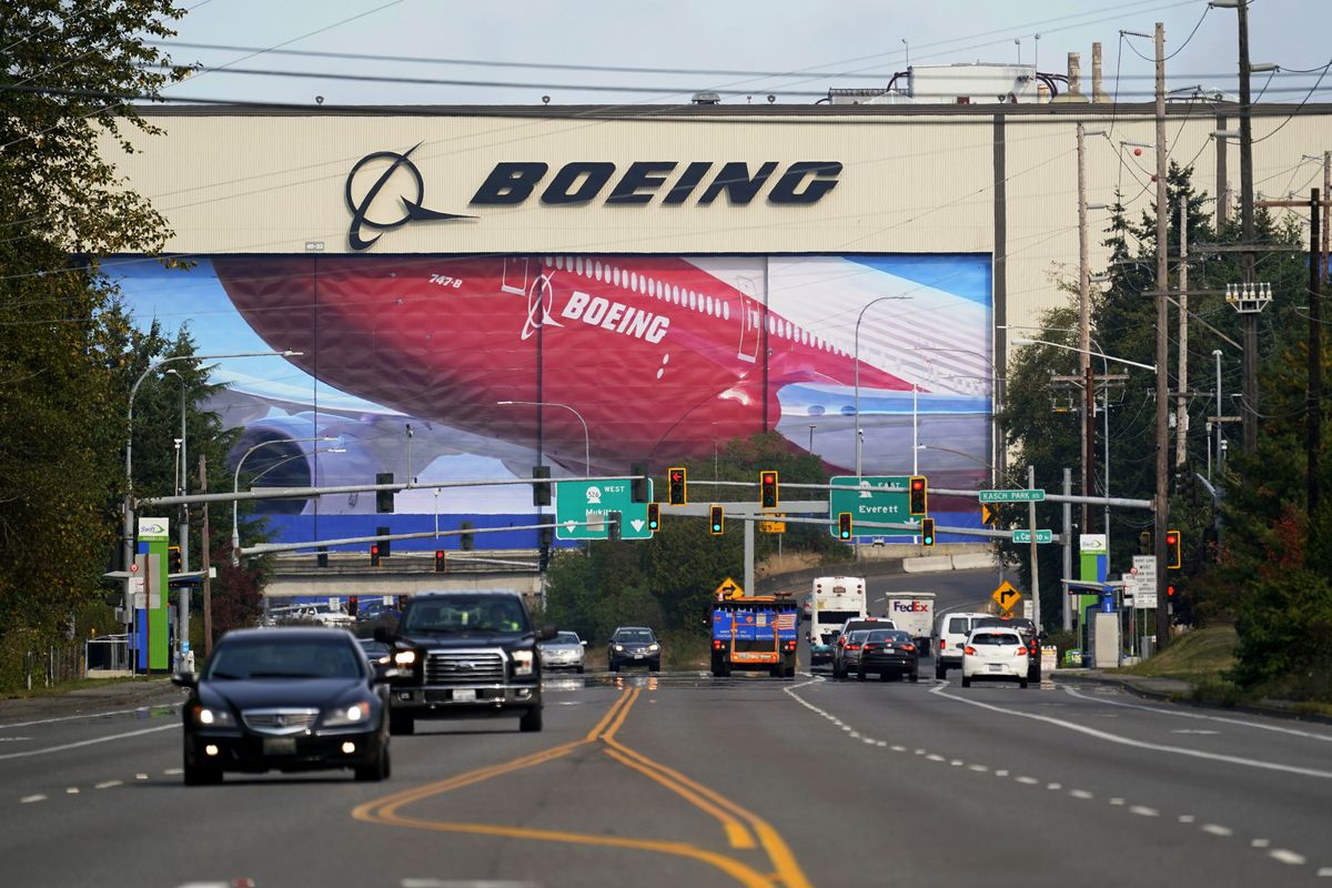 FILE - In this Oct. 1, 2020 file photo, traffic passes the Boeing airplane production plant, in Everett, Wash. The European Union pressed ahead Monday Nov. 9, 2020, with plans to impose tariffs and other penalties on up to $4 billion worth of U.S. goods and services over illegal American support for plane maker Boeing, but expressed hope that trade ties would improve once President Donald Trump leaves office.  (Elaine Thompson)