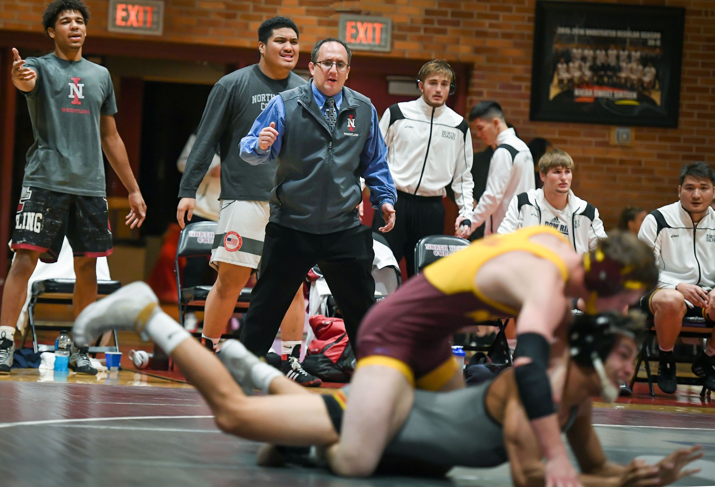 North Idaho College wrestling coach, who was interim president, placed