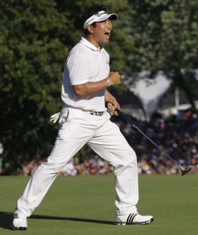 Y.E. Yang, of South Korea, celebrates after winning the 91st PGA Championship at the Hazeltine National Golf Club in Chaska, Minn., on Aug. 16, 2009. 
  (Associated Press)