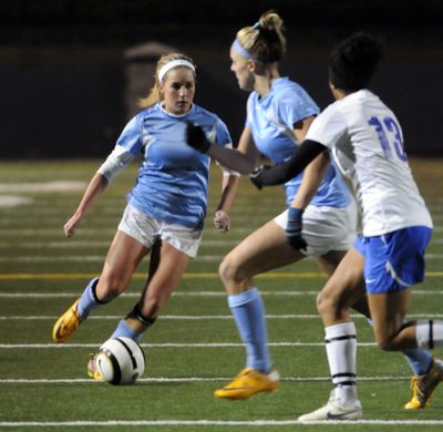 Central Valley junior Paige Gallaway dribbles through the Mead defense during the Bears defeat of the Panthers in a thrilling shootout, 3-2, in the first round of the State 4A soccer tournament, Wednesday. Gallaway scored a goal in the shootout. (J. Bart Rayniak)