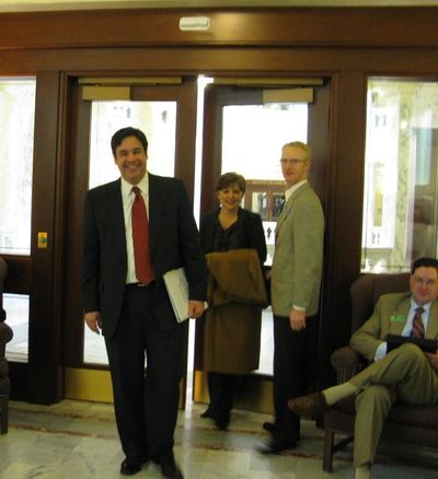 Rep. Raul Labrador, followed by his wife, Becca, enters the Idaho House lobby on Wednesday before addressing the state House for the first time as a congressman. Labrador previously served four years in the state House; he told lawmakers he's applying in Washington the lessons he learned in Idaho's statehouse. (Betsy Russell)