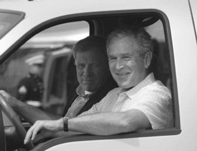 
President Bush with NATO Secretary-General Jaap de Hoop Scheffer at the Crawford Ranch. 
 (Associated Press / The Spokesman-Review)