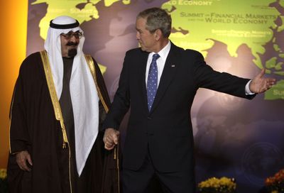 President George W. Bush greets King Abdullah, of Saudi Arabia, on Saturday in Washington.  (Associated Press / The Spokesman-Review)
