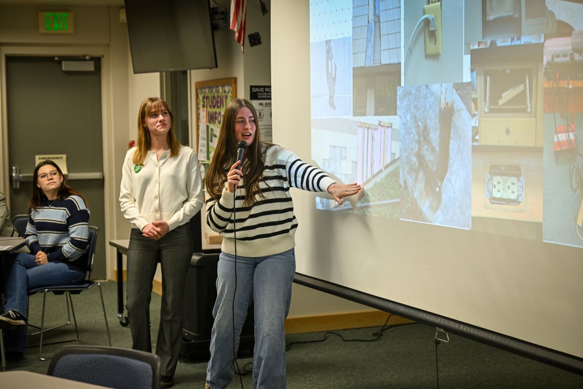 East Valley High School senior Aspen Seamone shows photos and speaks about the current condition of the EVHS building during a presentation in the school library about why the East Valley School District should pass a bond issue to build a new high school and middle school. The students