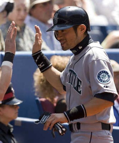 
Ichiro Suzuki steals two bases in ninth inning before scoring winning run. Associated Press
 (Associated Press / The Spokesman-Review)