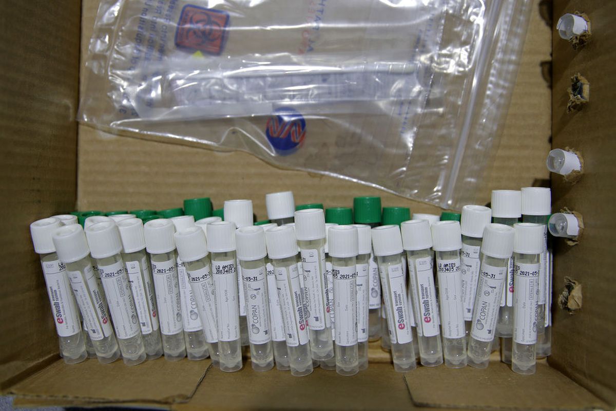 Coronavirus testing kits sit in a box at a drive-thru coronavirus testing site, Friday, July 10, 2020, in Las Vegas. (John Locher/AP)