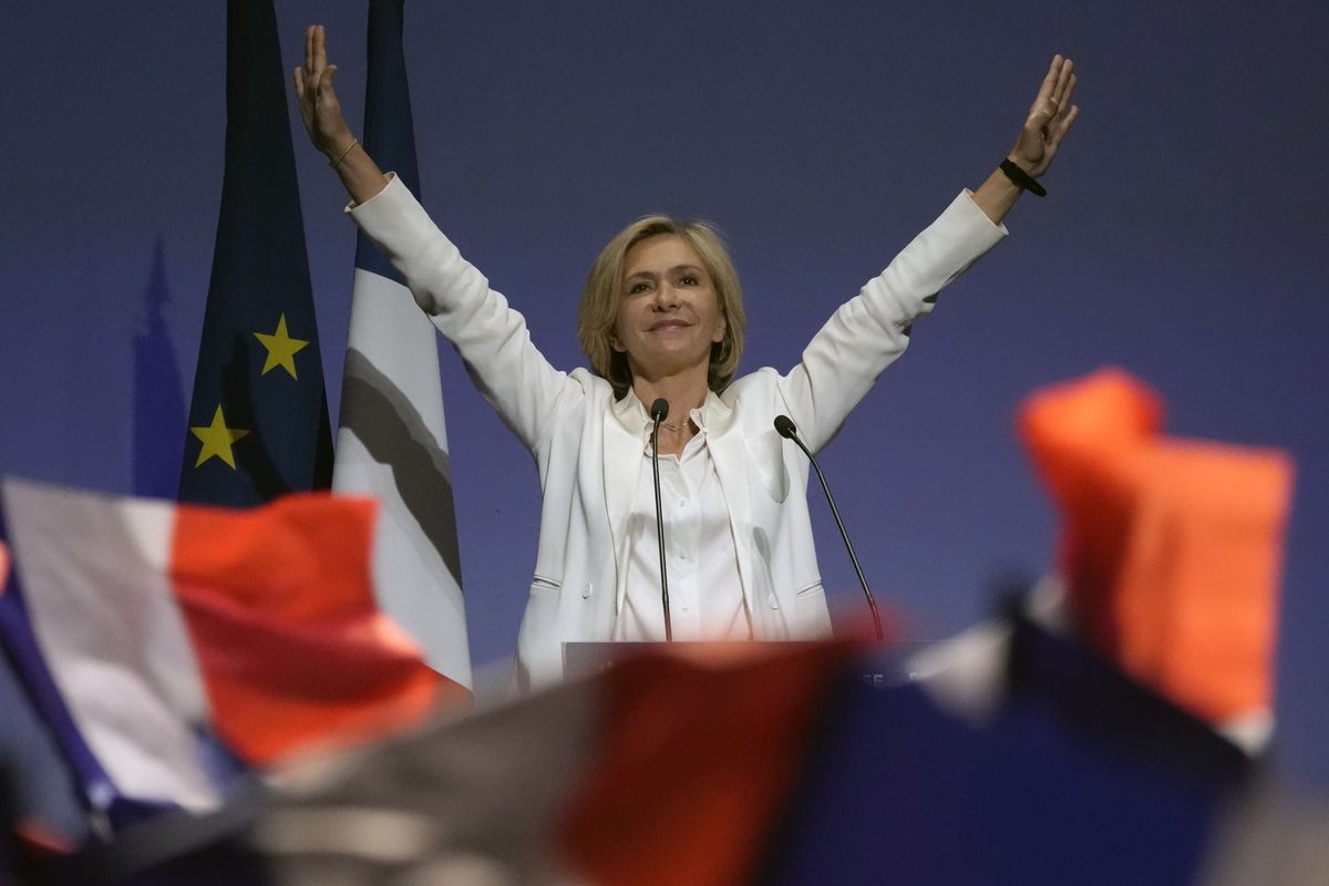 Valerie Pecresse, candidate for the French presidential election 2022, waves after delivering a speech during a meeting in Paris, France, Saturday, Dec. 11, 2021. The first round of the 2022 French presidential election will be held on April 10, 2022 and the second round on April 24, 2022.  (Christophe Ena)