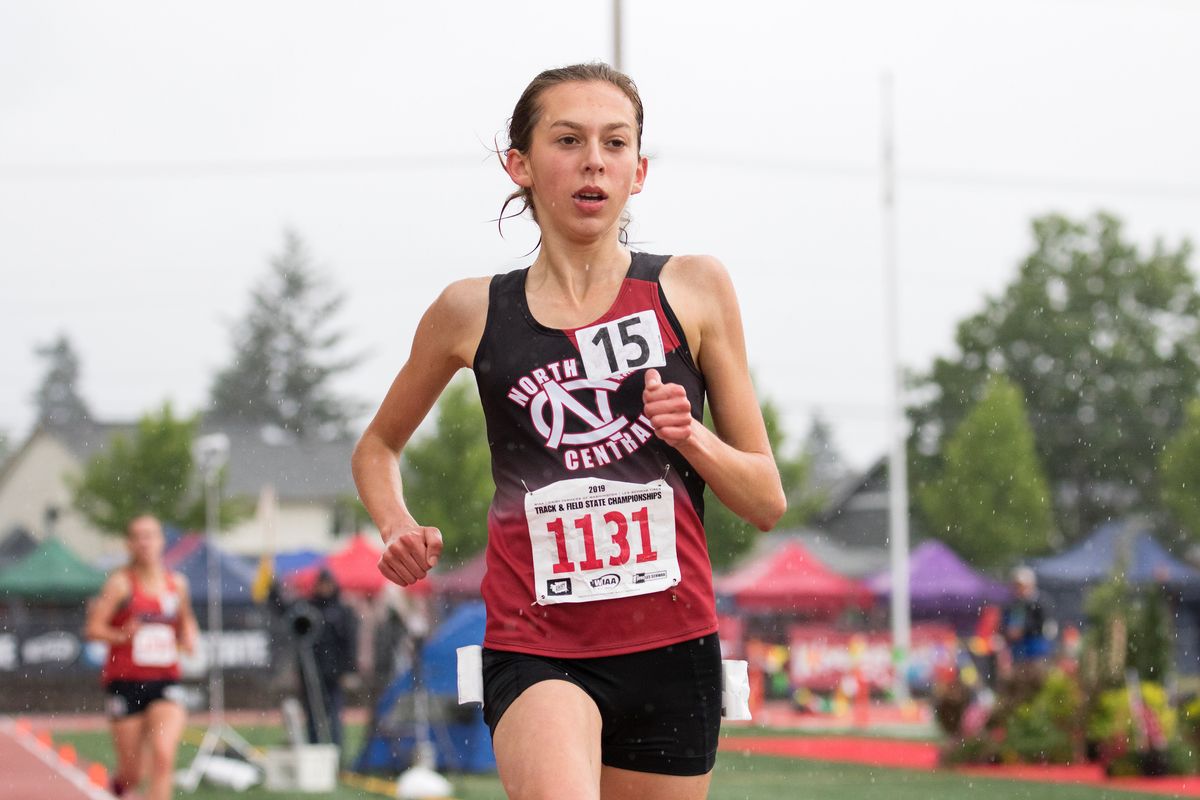 North Central’s Allie Janke cruises to a meet-record win in the 3,200-meter finals at the State 3A meet on May 25, 2019, in Tacoma.  (Patrick Hagerty)