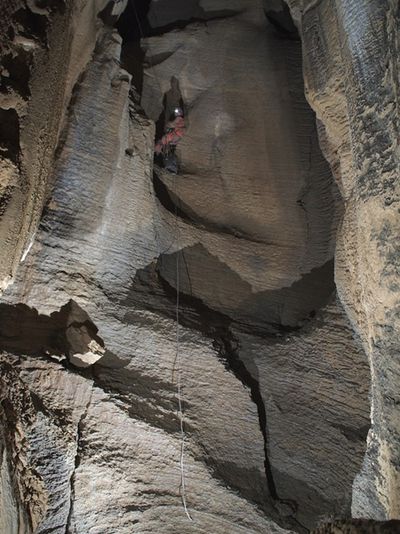 Beth Cortright rappelling down Birthday Pit in Tears of the Turtle Cave. (James Hunter / Courtesy)