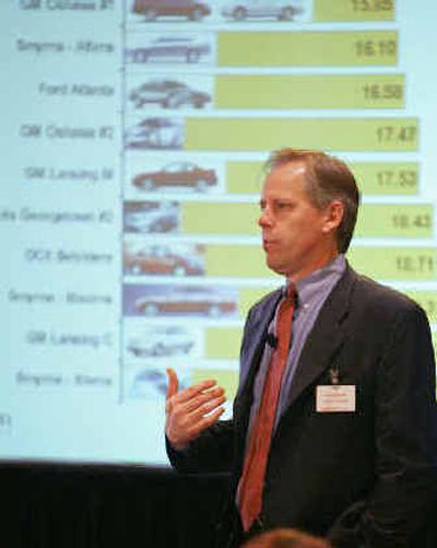 
Harbour Consulting president Ron Harbour discusses his company's report on automotive productivity in Detroit on Thursday. 
 (Associated Press / The Spokesman-Review)