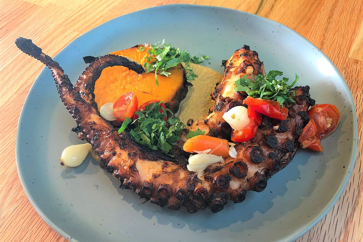 Pulpo con sikil pak (charred Spanish octopus with smoked squash) at Zona Blanca downtown. (Don Chareunsy/The Spokesman-Review)