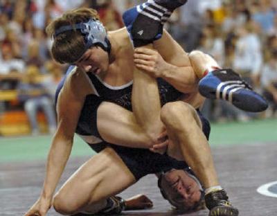 
In an all-Bonners Ferry final at 152 pounds, Adam Hall, top, works toward a win over Ken Swift. 
 (Associated Press / The Spokesman-Review)