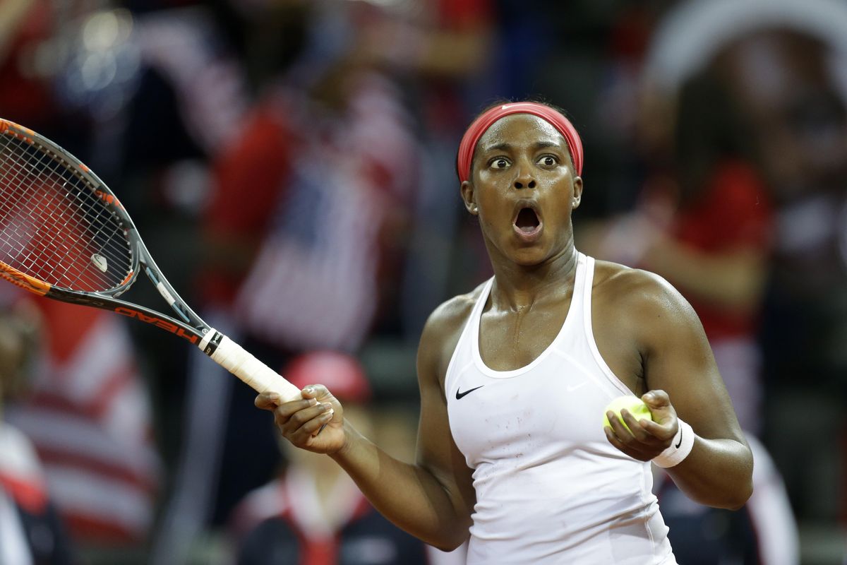 Sloane Stephens of USA celebrates after defeating Pauline Parmentier of France during the Fed Cup semifinal singles tennis match in Aix-en-Provence, southern France, Saturday, April 21, 2018. (Claude Paris / Associated Press)