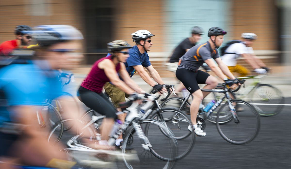Bicyclists head west on Spokane Falls Boulevard on Sunday morning during the fifth annual SpokeFest. (Colin Mulvany)