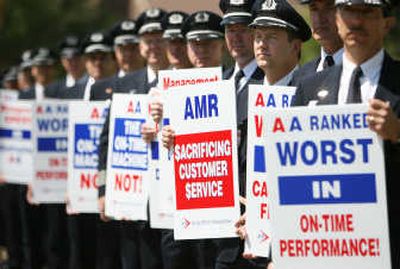 
American Airlines pilots protest Tuesday  in Irving, Texas. The pilots, who are in contract negotiations, blame management for flight delays and increasing customer dissatisfaction. Associated Press photos
 (Associated Press photos / The Spokesman-Review)