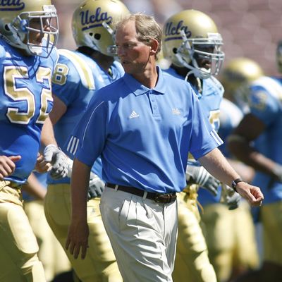 Rick Neuheisel has turned around UCLA's offense by going to the pistol. (Associated Press / The Spokesman-Review)