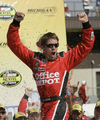 
Carl Edwards celebrates the end of his 52-race winless streak.  Associated Press
 (Associated Press / The Spokesman-Review)