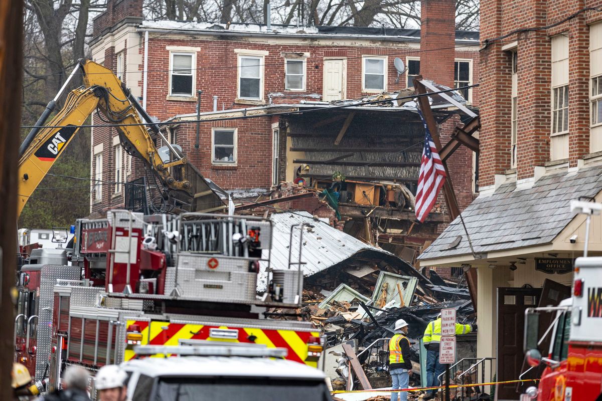 An explosion at the West Reading R.M. Palmer Co. killed at least 5 in Pennsylvania on Friday. Rescue workers, firefighters and police were searching Saturday for people who are still missing.  (Tyger Williams/The Philadelphia Inquirer/TNS)