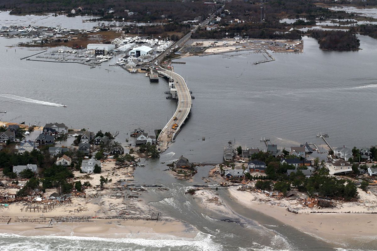 The view of storm damage over the Atlantic Coast in Seaside Heights, N.J.,  Wednesday, Oct. 31, 2012, from a helicopter traveling behind the helicopter carrying President Obama and New Jersey Gov. Chris Christie, as they viewed storm damage from superstorm Sandy. (Doug Mills / Pool The New York Times)