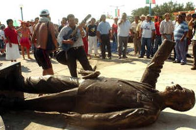 
A statue of former Mexican President Vicente Fox was knocked down Saturday by residents in Boca del Rio hours after it had been placed. A dedication ceremony was canceled.Associated Press
 (Associated Press / The Spokesman-Review)