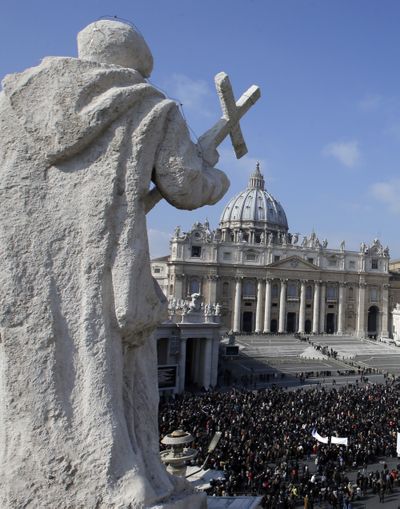 Faithful gather to listen to pope Benedict XVI's Angelus prayer in St. Peter's square at the Vatican, Sunday, Feb. 17, 2013. Pope Benedict XVI blessed the faithful from his window overlooking St. Peter's Square for the first time since announcing his resignation, cheered by an emotional crowd of tens of thousands of well-wishers from around the world. (Gregorio Borgia / Associated Press)
