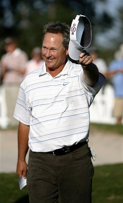 John Cook waves to the crowd after winning the Administaff Small Business Classic golf tournament at The Woodlands Country Club, Sunday, Oct. 18, 2009, in The Woodlands, Texas. Cook won the tournament with an 11-under par score..  (Karen Warren / AP Photo/Houston Chronicle)