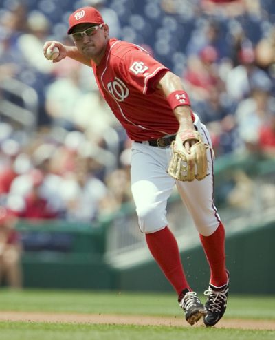 Ryan Zimmerman led all third basemen with 325 assists in 2009.  (Associated Press)