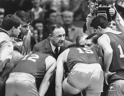 Actor Gene Hackman gives fictional Hickory High basketball players instructions during filming of the final game of the movie “Hoosiers” at Hinkle Fieldhouse on the Butler University campus in Indianapolis. “Hoosiers” shot all the way to No. 1 in The Associated Press Top 25 of best sports movies, a one-of-a-kind poll from the news organization known for its rankings of college teams. (Tom Strickland / AP)