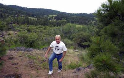 
Ron Oman walks through the east side of the property that Lanzce Douglass wants to develop in the Ponderosa neighborhood in Spokane Valley. The development will be made up of 179 lots. Oman is one of the residents in the Ponderosa neighborhood who oppose the development.
 (Liz Kishimoto / The Spokesman-Review)