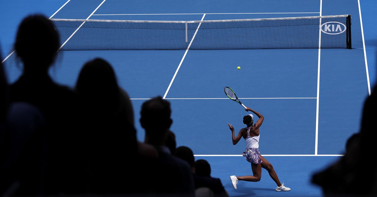 United States’ Venus Williams makes a forehand return to compatriot Coco Vandeweghe during their semifinal at the Australian Open tennis championships in Melbourne, Australia, Thursday, Jan. 26, 2017. (Kin Cheung / Associated Press)