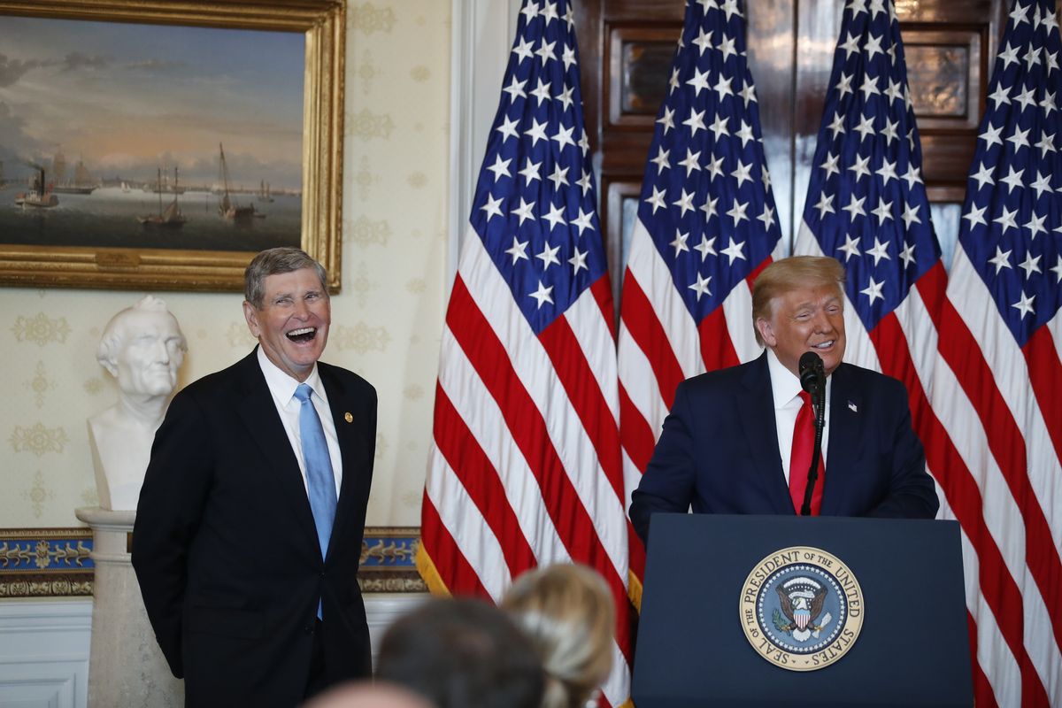 President Donald Trump speaks during an event to present the Presidential Medal of Freedom to Jim Ryun, left, in the Blue Room of the White House, Friday, July 24, 2020, in Washington.  (Alex Brandon)
