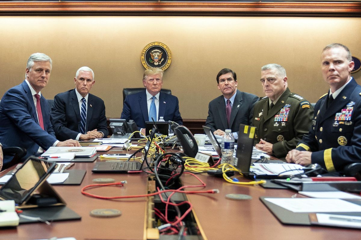 In this photo provided by the White House, President Donald Trump is joined by from left, national security adviser Robert O’Brien, Vice President Mike Pence, Defense Secretary mark Esper, Joint Chiefs Chairman Gen. Mark Milley and Brig. Gen. Marcus Evans, Deputy Director for Special Operations on the Joint Staff, Saturday, Oct. 26, 2019, in the Situation Room of the White House in Washington. monitoring developments as in the U.S. Special Operations forces raid that took out Islamic State leader Abu Bakr al-Baghdadi. (Shealah Craighead/The White House via AP) ORG XMIT: DCJE102 (Shealah Craighead / AP)