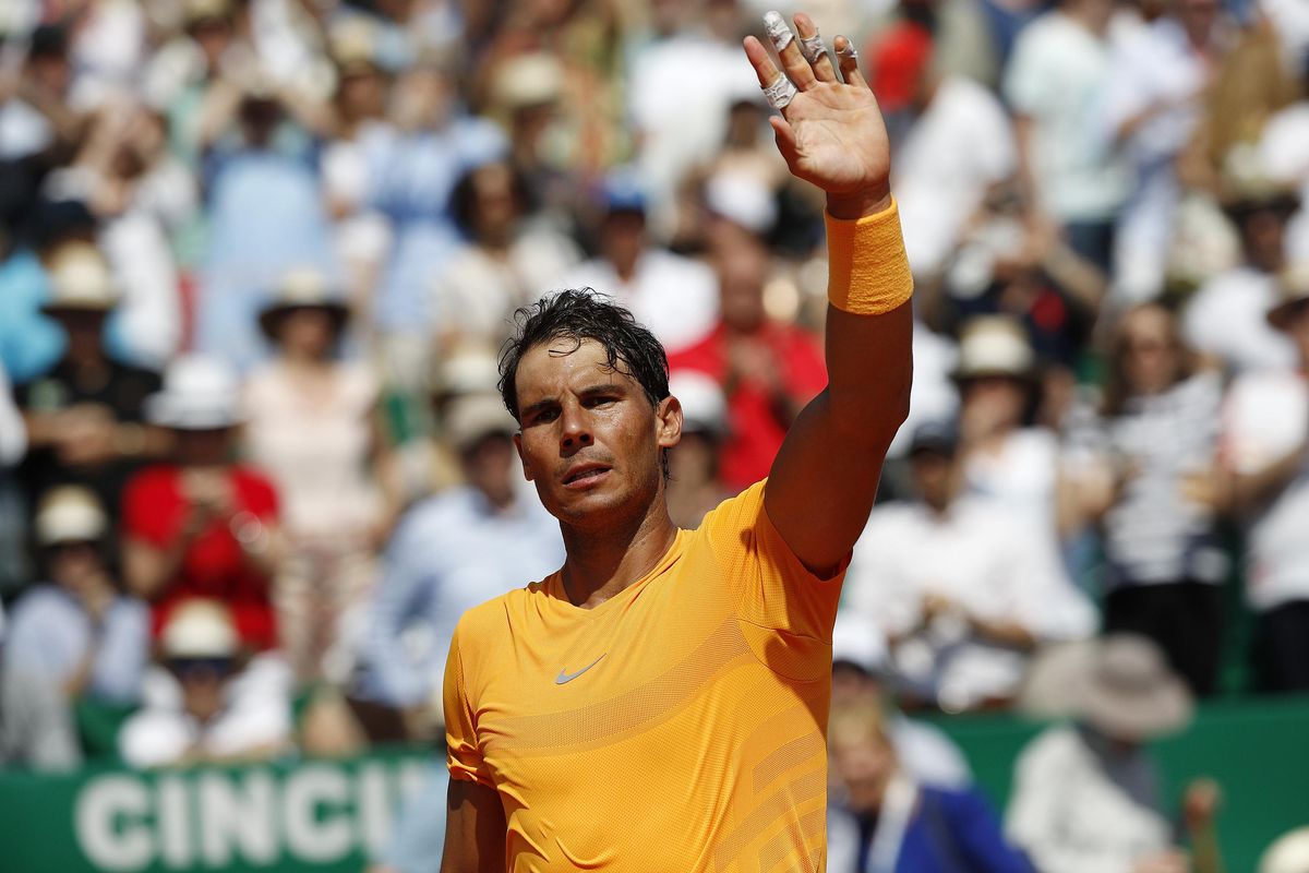 Spain’s Rafael Nadal waves to the crowd after winning the semifinal match against Bulgaria’s Gregor Dimitrov af the Monte Carlo Tennis Masters tournament in Monaco, Saturday April 21, 2018. (Christophe Ena / Associated Press)