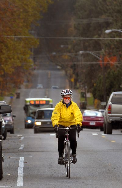 Eileen Hyatt rides north on Perry Street from the South Hill neighborhood last November. She is an advocate for safety and helping make Spokane more  bicycle friendly.  (Christopher Anderson)