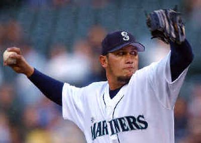 
 Mariners starting pitcher Freddy Garcia throws against the Minnesota Twins in the first inning.  Mariners starting pitcher Freddy Garcia throws against the Minnesota Twins in the first inning. 
 (Associated PressAssociated Press / The Spokesman-Review)