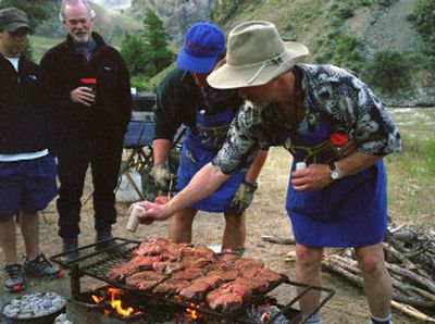 
Idaho river rafting guides have become masters at making remote wilderness trips luxury events, complete with fine meals such as grilled steaks.
 (Associated Press / The Spokesman-Review)