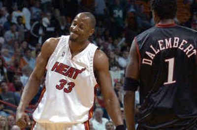 
He may have to bite his lip from time to time, but Alonzo Mourning could have a shot at winning an NBA championship in his reduced role with the Miami Heat. 
 (Associated Press / The Spokesman-Review)