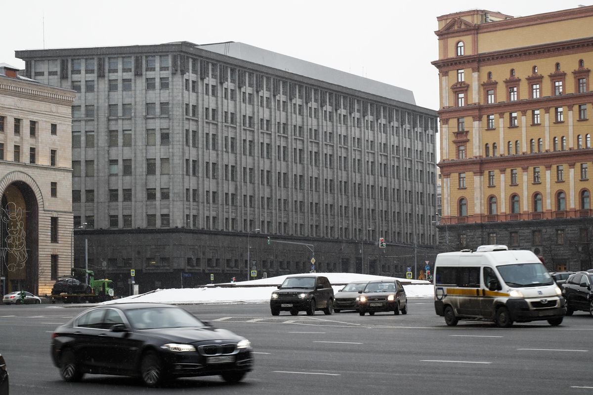 In this Friday, Dec. 30, 2016, photo, cars pass the FSB headquarters in downtown Moscow, Russia. A U.S. indictment of two Russian intelligence agents and two hackers alleged to have stolen more than half a billion U.S. email accounts in 2014 has shone a spotlight on the intertwining of the Russian security services and the murky digital underworld. The intelligence officers of the powerful FSB, Russia’s Federal Security Service, are accused of employing cybercriminals to access Yahoo’s systems and steal data on millions of ordinary users as well as U.S. and Russian officials, Russian journalists and executives at large private companies. (Alexander Zemlianichenko / Associated Press)