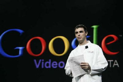 
Google CEO Larry Page announces Google Video Store on Friday at the International Consumer Electronics Show, CES, in Las Vegas. 
 (Associated Press / The Spokesman-Review)