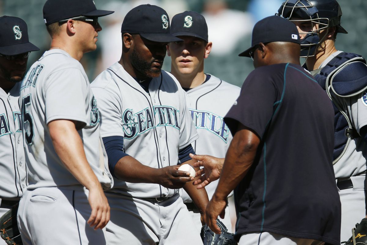 Seattle reliever Fernando Rodney, left, struggled in the ninth inning Wednesday. (Associated Press)