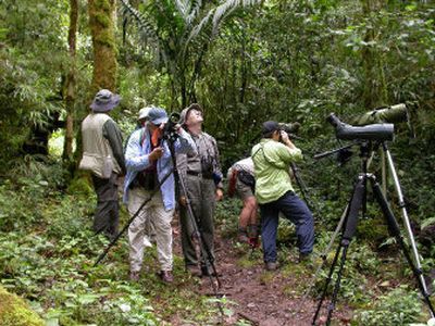 
This photo provided by family members shows Christine Williamson, far right, and other bird chasers on a trip into Costa Rica's Talamanca Mountains in August. Williamson is one of countless baby boomers who share an expensive passion and have the wherewithal for travel.
 (Associated Press / The Spokesman-Review)