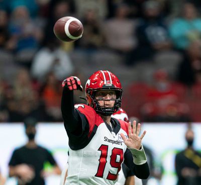 Calgary Stampeders quarterback Bo Levi Mitchell throws a pass against the BC Lions during the first half of a CFL game at BC Place on Oct. 16, 2021, in Vancouver, British Columbia. (Getty Images)