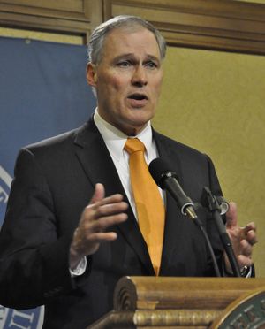 OLYMPIA – Gov. Jay Inslee tells reporters he vetoed 27 bills after lawmakers failed to come up with a supplemental budget in the regular session. Their special session started Thursday about 30 minutes after the regular session ended. (Jim Camden / The Spokesman-Review)