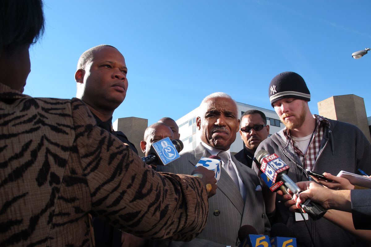 Memphis Police Department Director Toney Armstrong, left, and Memphis Mayor A C Wharton Jr., center,  speak with reporters outside the Regional Medical Center after two police officers were involved in a shooting on Friday, Dec. 14, 2012 in Memphis, Tenn. One officer was killed and another officer was wounded. The wounded officer was being treated at the medical center. (Adrian Sainz / Associated Press)