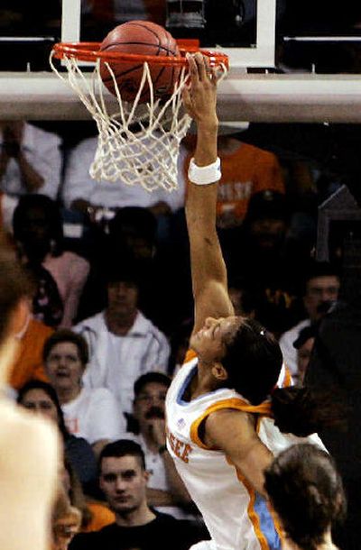 
Tennessee forward Candace Parker puts down the first dunk in NCAA tourney history. 
 (Associated Press / The Spokesman-Review)