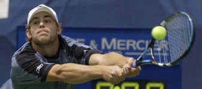 
Andy Roddick of the United States returns a shot to Ivan Ljubicic of Croatia during a semifinal match in the RCA Championships in Indianapolis on Saturday.
 (Associated Press / The Spokesman-Review)