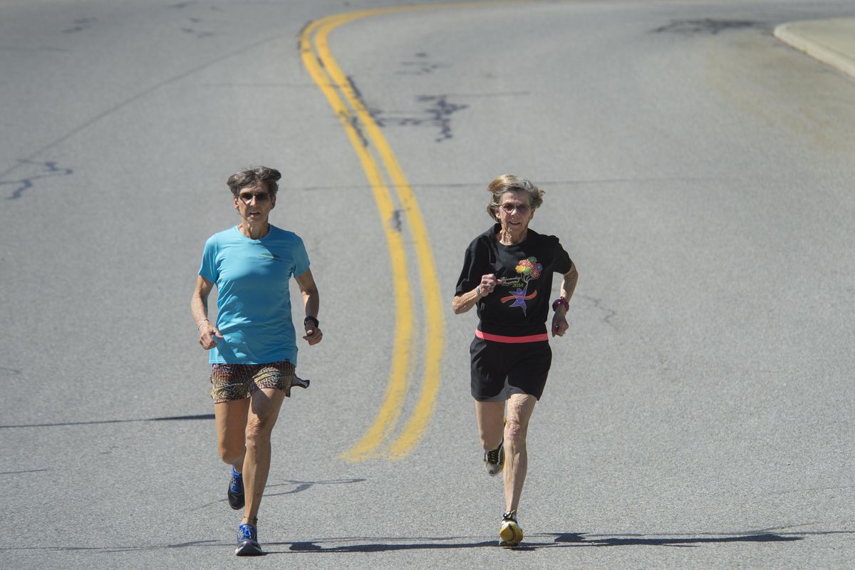 Running partners Gunhild Swanson, 72, left, and Sylvia Quinn, 80, have logged many miles together on  streets and trails. (Dan Pelle / The Spokesman-Review)