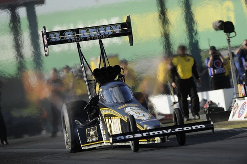 Tony Schumacher, the Top Fuel points leader in the 8,000-horsepower category, posted a 3.769 second run at 326.08 mph in his U.S. Army dragster to move from the bottom of the qualifying order up to the top of the 16-car field at Heartland Park Topeka. (Photo courtesy of NHRA)